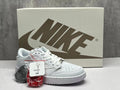 Air Jordan 1 Low All-White Reverse Swoosh Sneakers