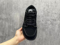 Air Jordan 1 Low Black Reverse Swoosh Sneakers | White Stitching