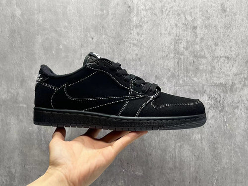 Air Jordan 1 Low Black Reverse Swoosh Sneakers | White Stitching