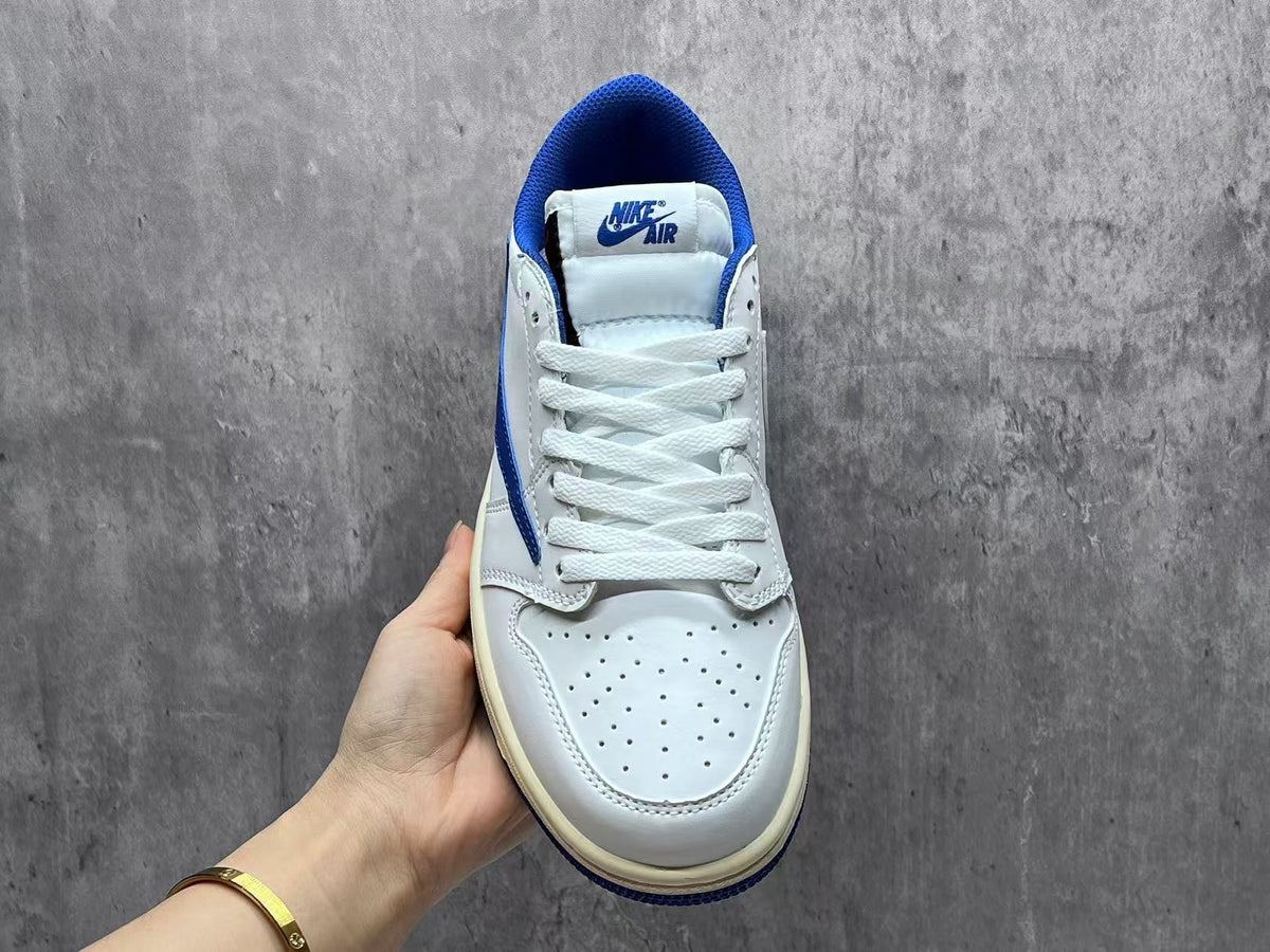 Air Jordan 1 Low White & Blue Reverse Swoosh Sneakers