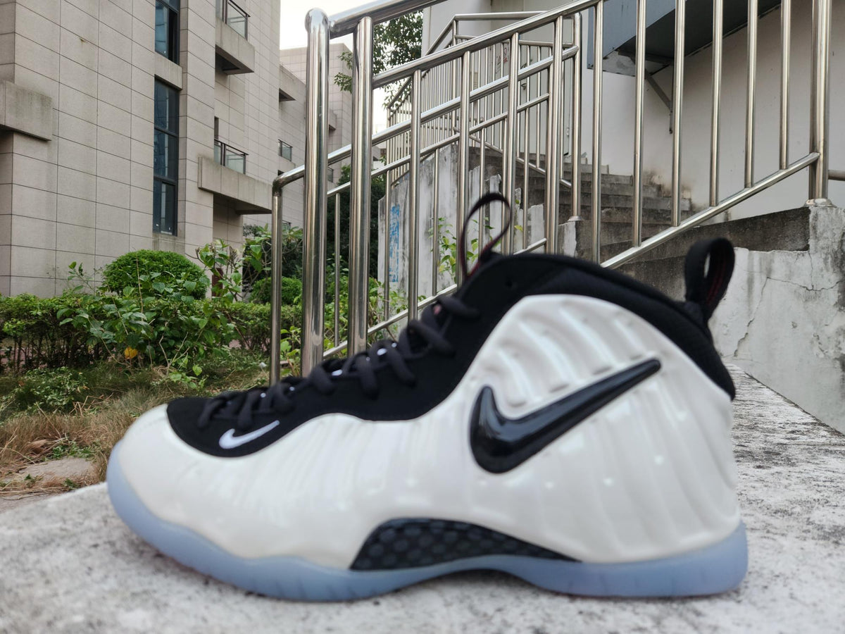 Nike Foamposite White & Black Sneakers with Icy Blue Soles