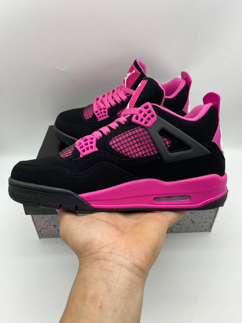 Air Jordan 4 Black & Pink Sneakers