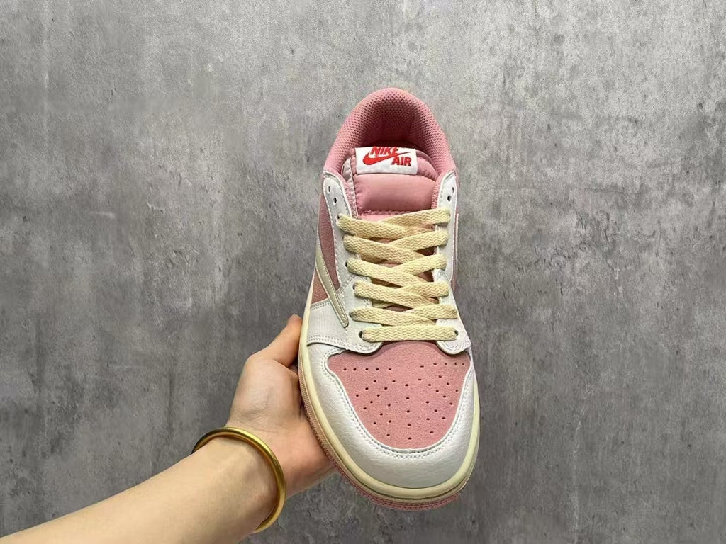 Air Jordan 1 Low Pink & White Reverse Swoosh Sneakers