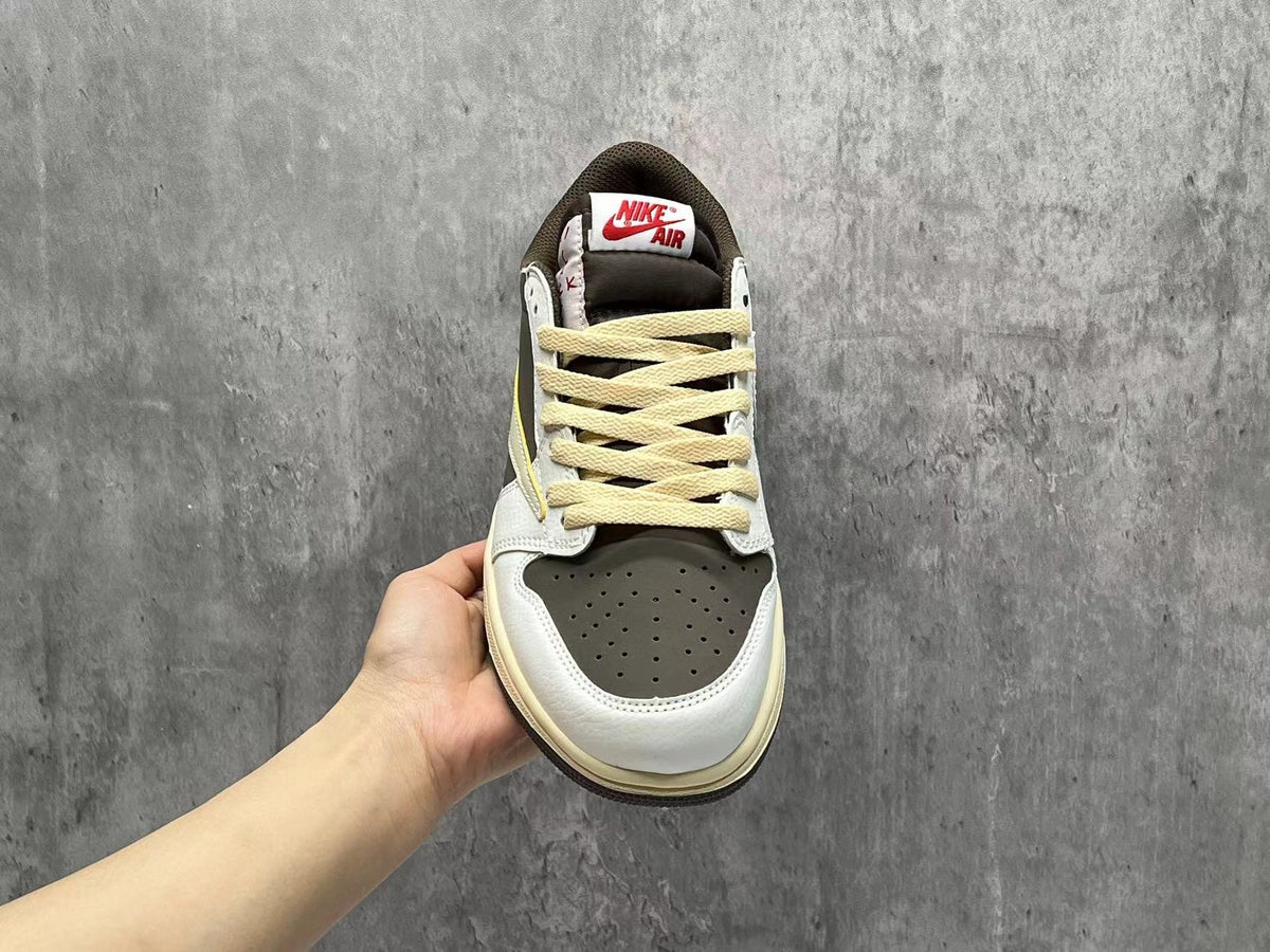 Air Jordan 1 Low White & Brown Reverse Swoosh Sneakers