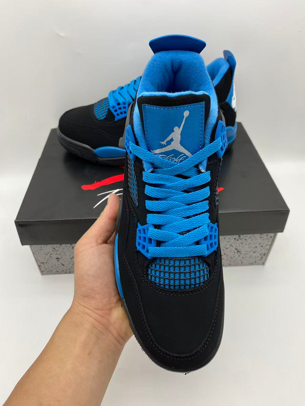 Air Jordan 4 Black & Blue Sneakers