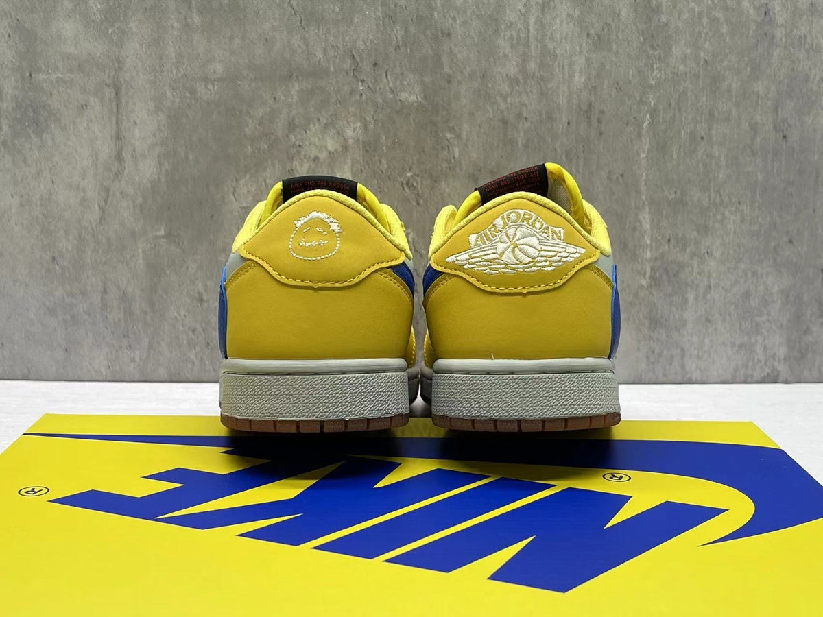 Air Jordan 1 Low Yellow & White Blue Reverse Swoosh Sneakers