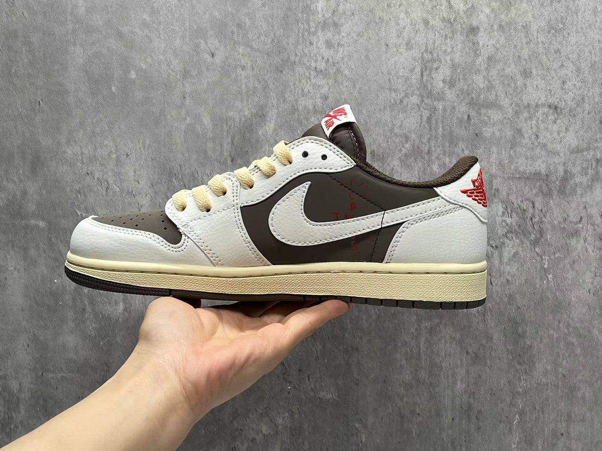 Air Jordan 1 Low White & Brown Reverse Swoosh Sneakers