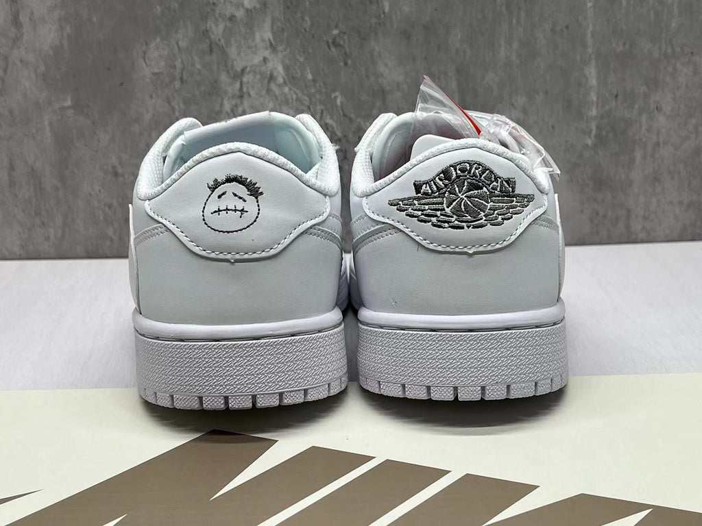Air Jordan 1 Low All-White Reverse Swoosh Sneakers