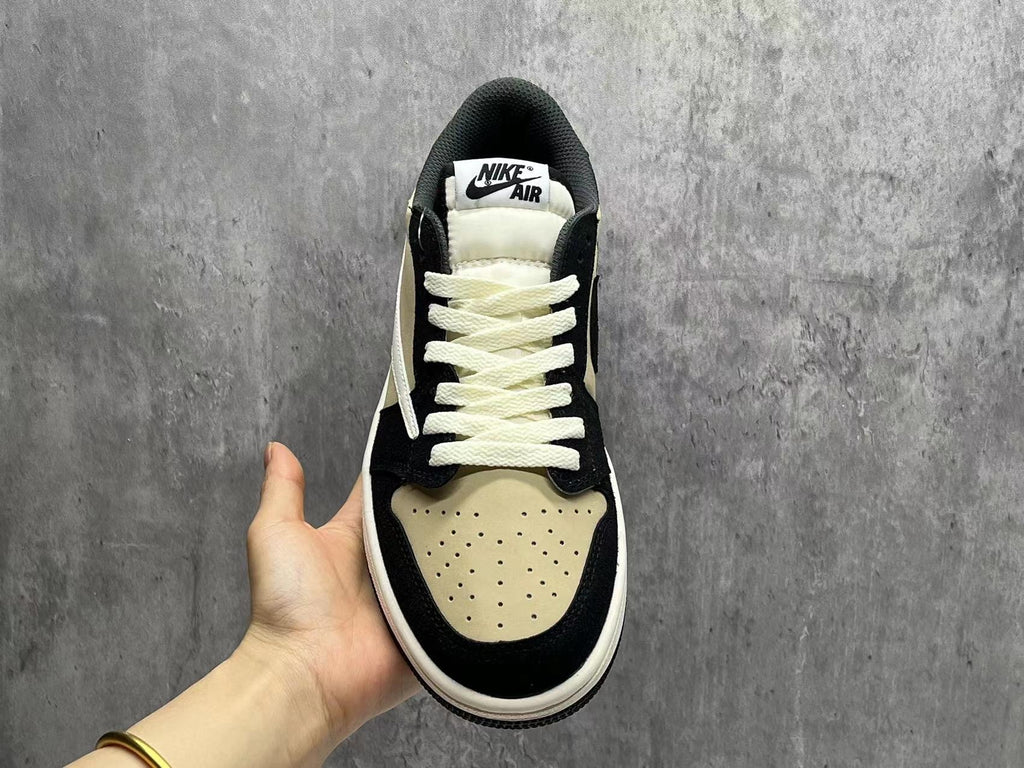 Air Jordan 1 Low Beige & Black Reverse Swoosh Sneakers