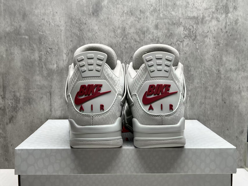 Air Jordan 4 Grey Sneakers with Red Accents
