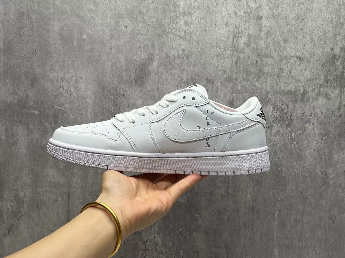 Air Jordan 1 Low All-White Reverse Swoosh Sneakers