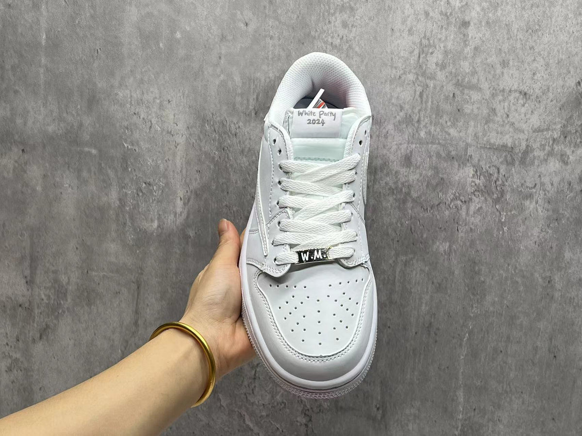 Air Jordan 1 Low All-White Reverse Swoosh Sneakers